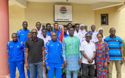 Minister Badgie Handover Battle Flag to Team Gambia